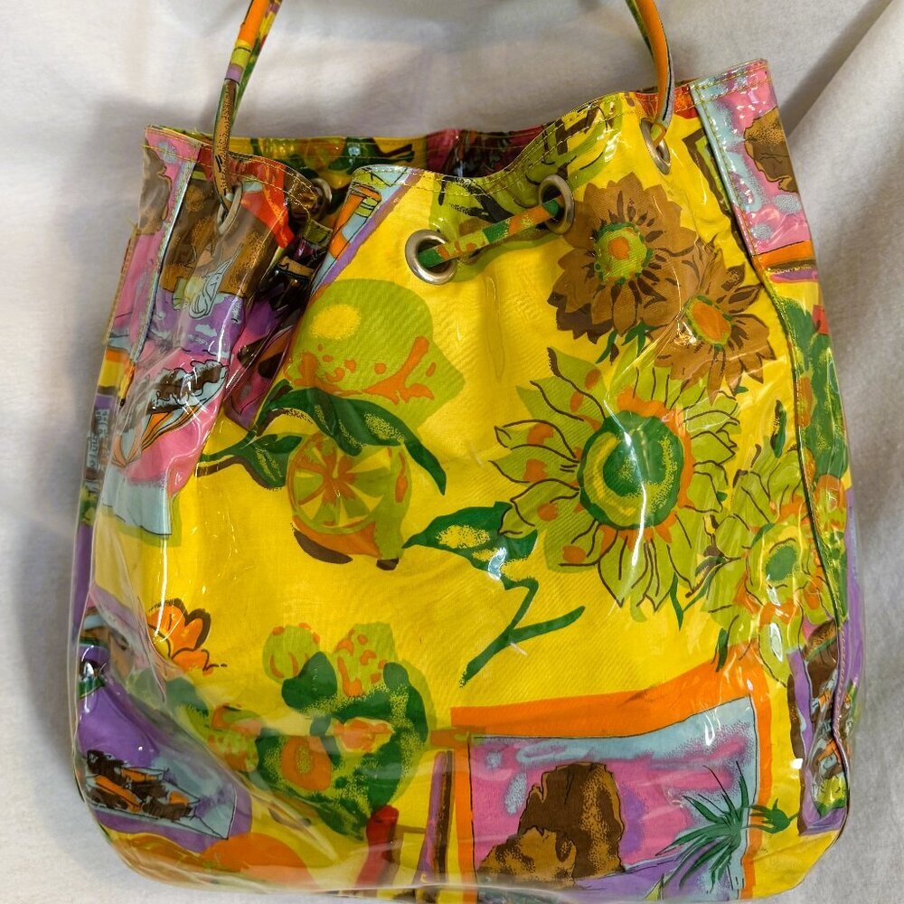 Sun & Sand Tote, beautiful floral print canary yellow fabric, plastic covered.